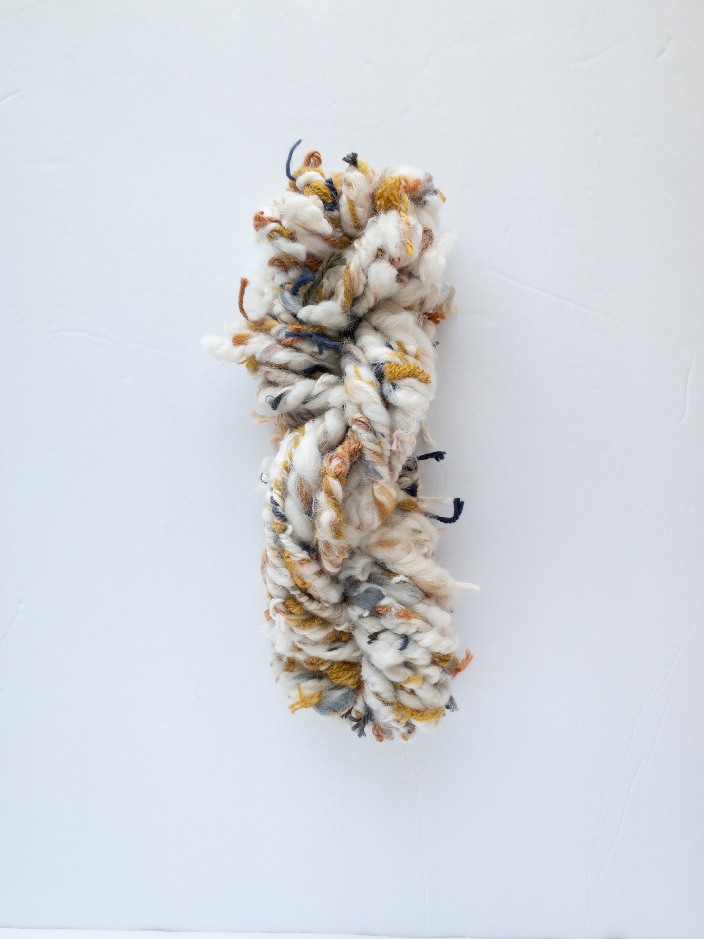 Colorful scrappy handspun art yarn