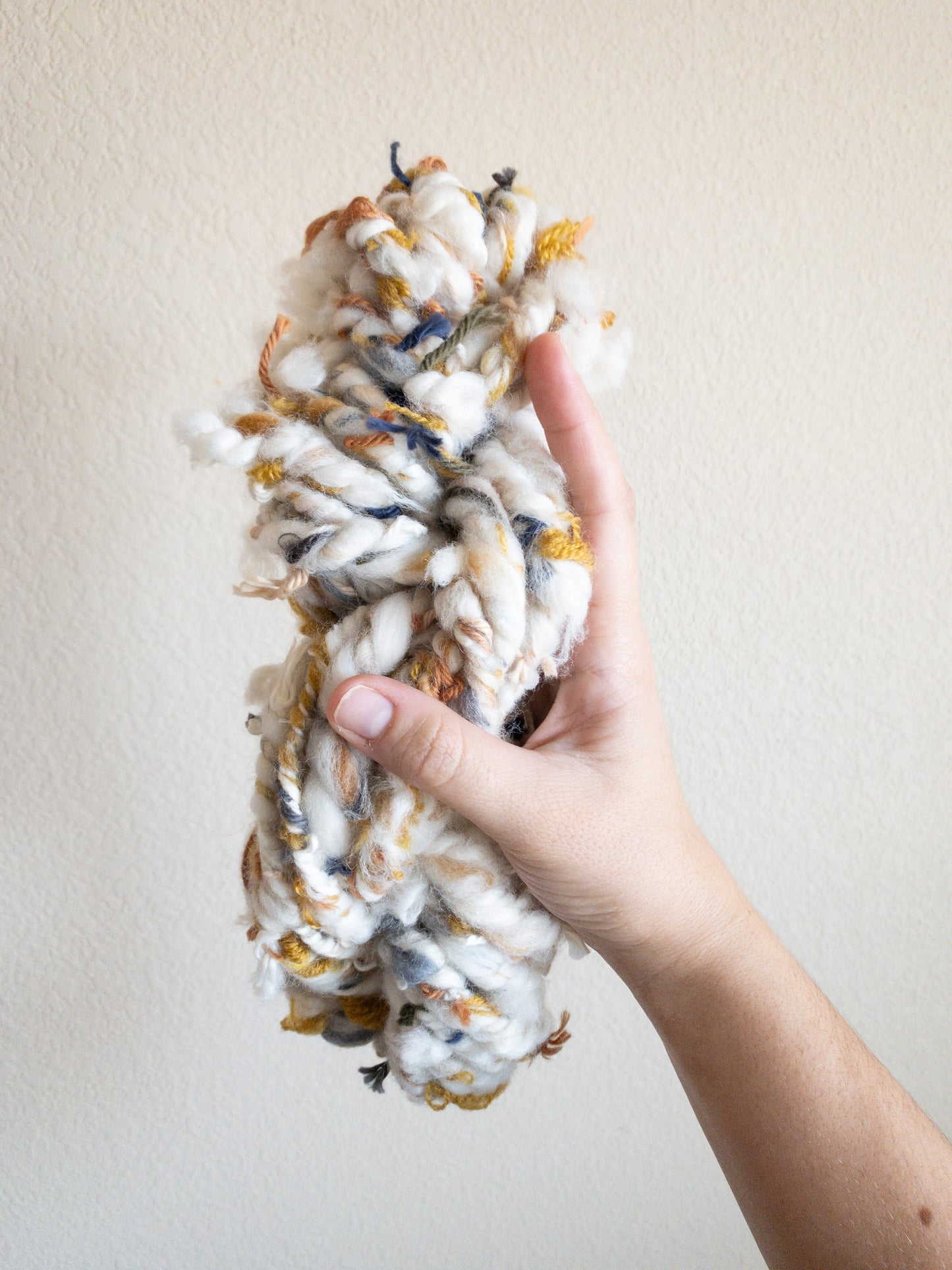 Colorful scrappy handspun art yarn