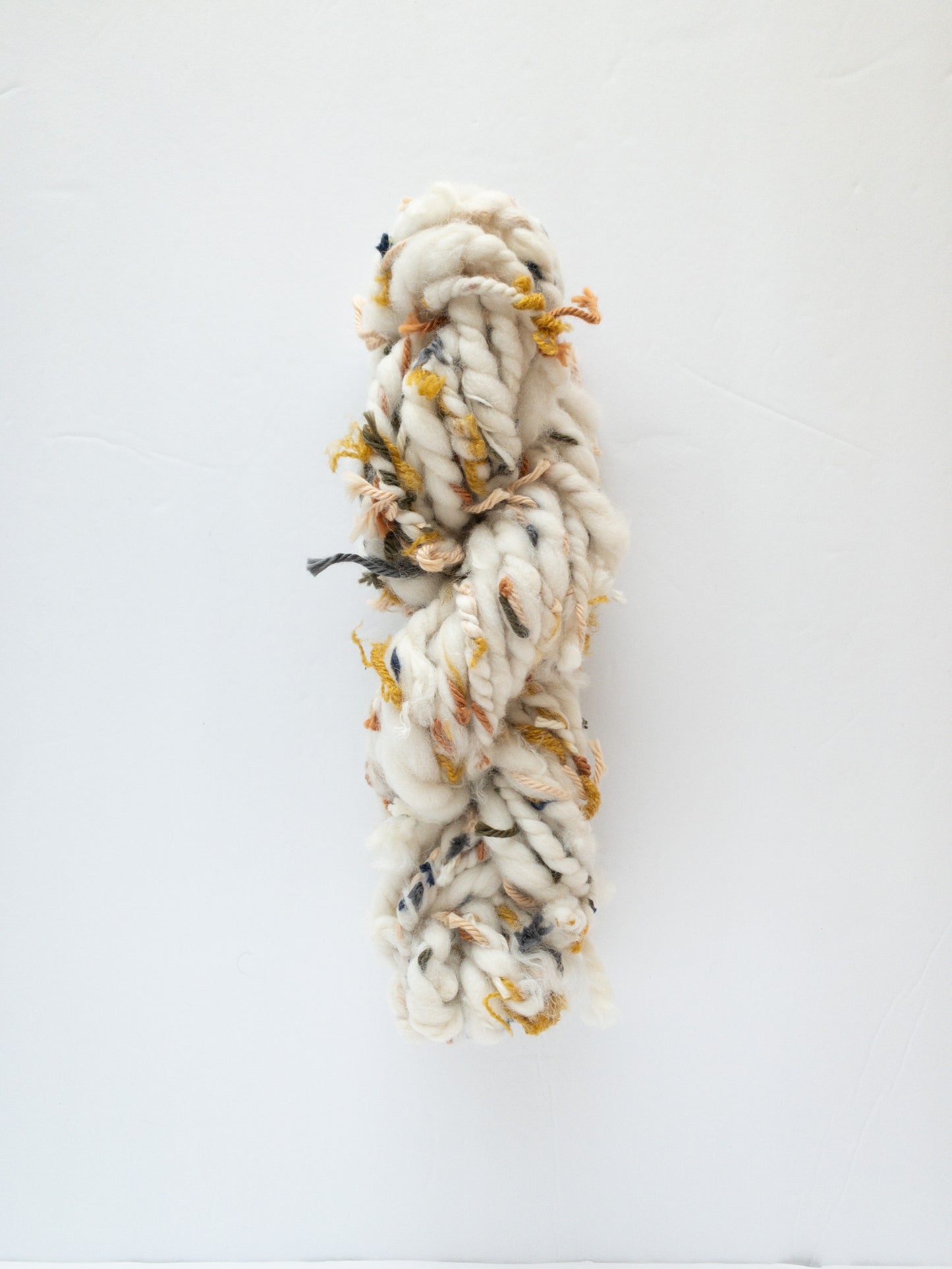 Colorful scrappy handspun art yarn