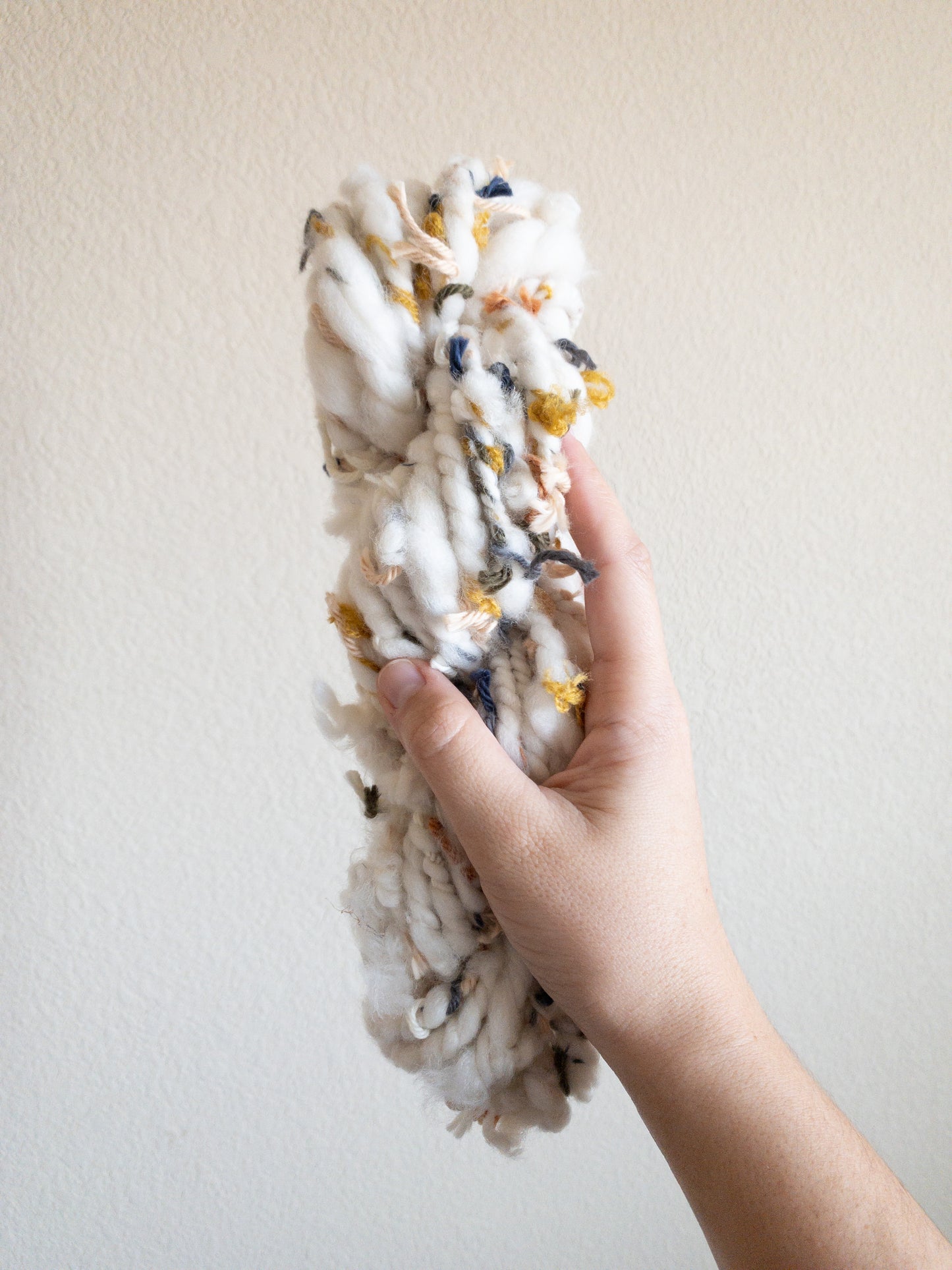 Colorful scrappy handspun art yarn