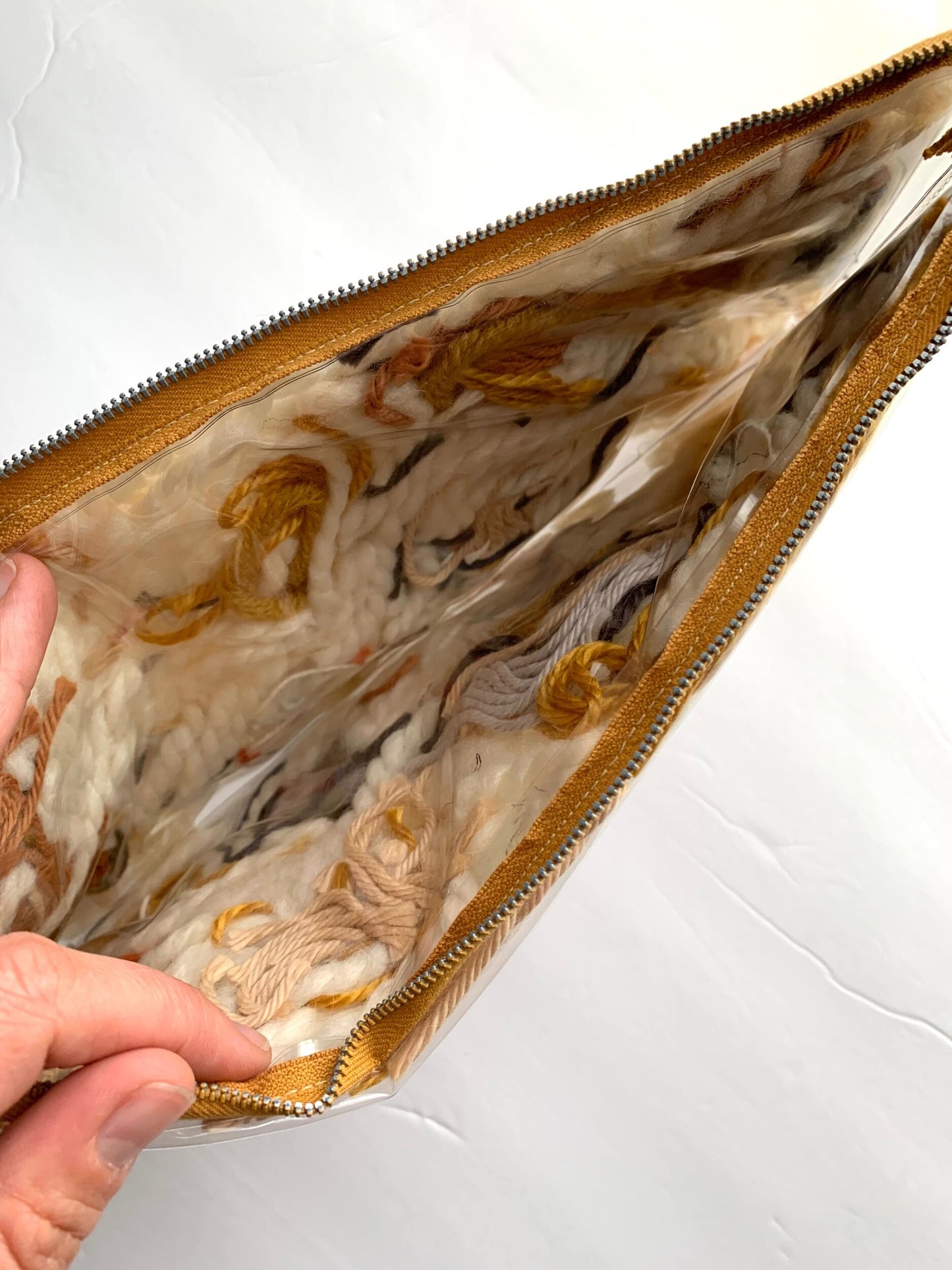 Small upcycled pouch / 2 sided yarn filled