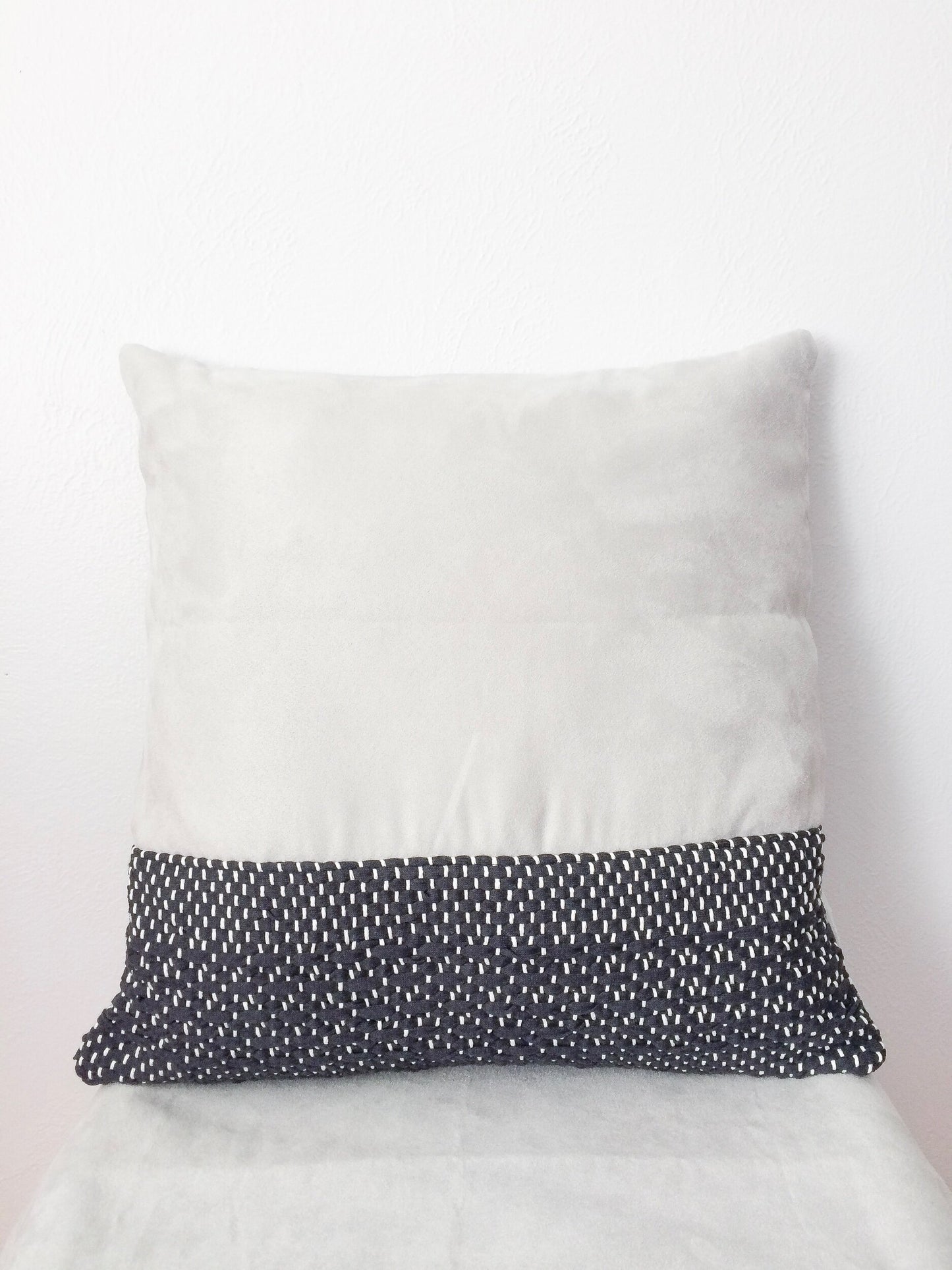 Charcoal and grey woven pillow