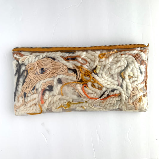 Small upcycled pouch / 2 sided yarn filled